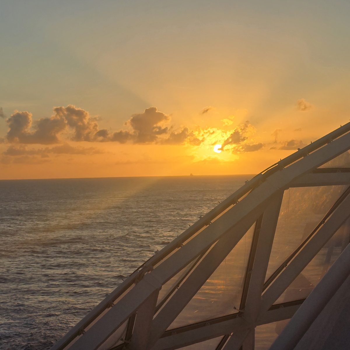 Sunset at sea from cruise deck