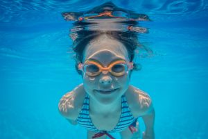 Underwater portrait of child